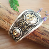 Handmade Tibetan Om White Metal and Brass Torque Bangle